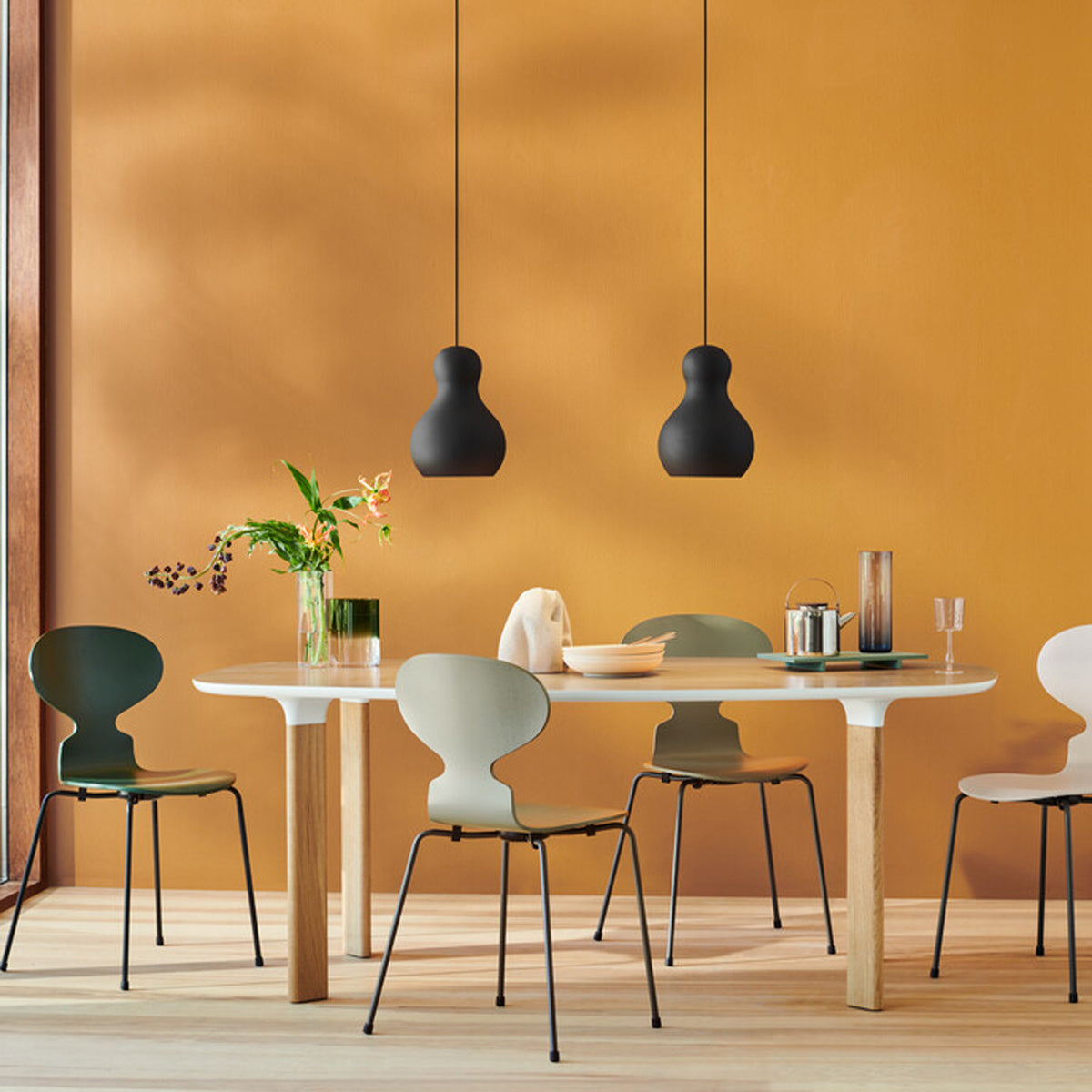Analog Table by Fritz Hansen, showing analog table in live shot.