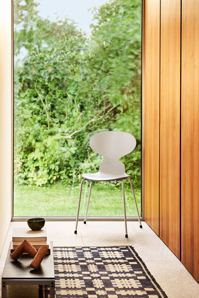 Ant Chair by Fritz Hansen, showing ant chair in live shot.