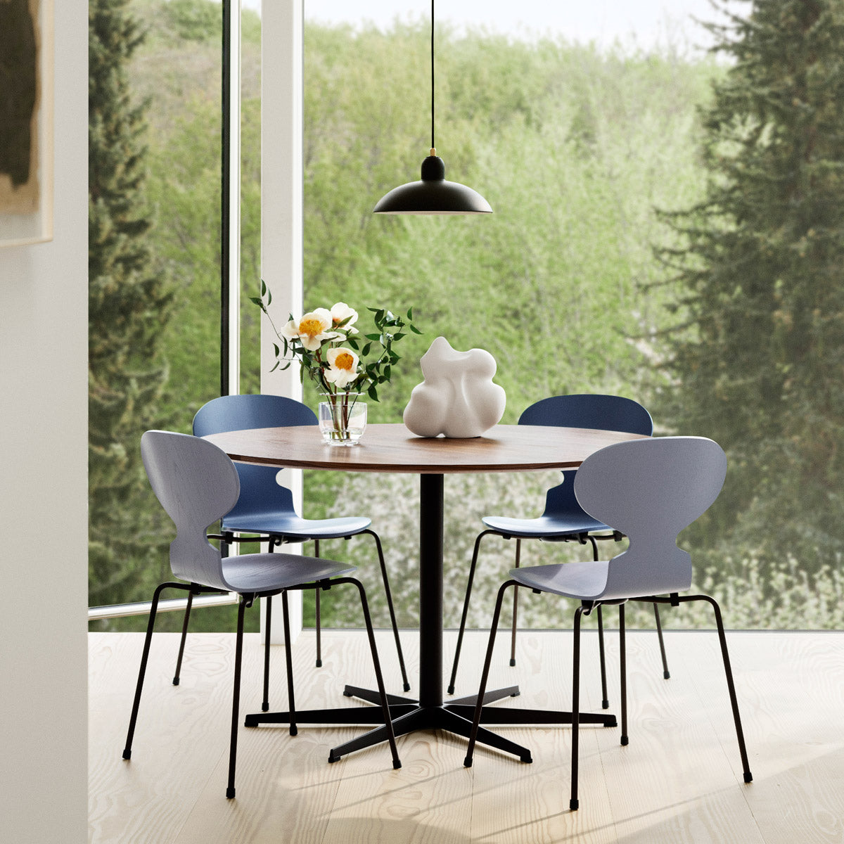 Ant Chair by Fritz Hansen, showing ant chairs in live shot.