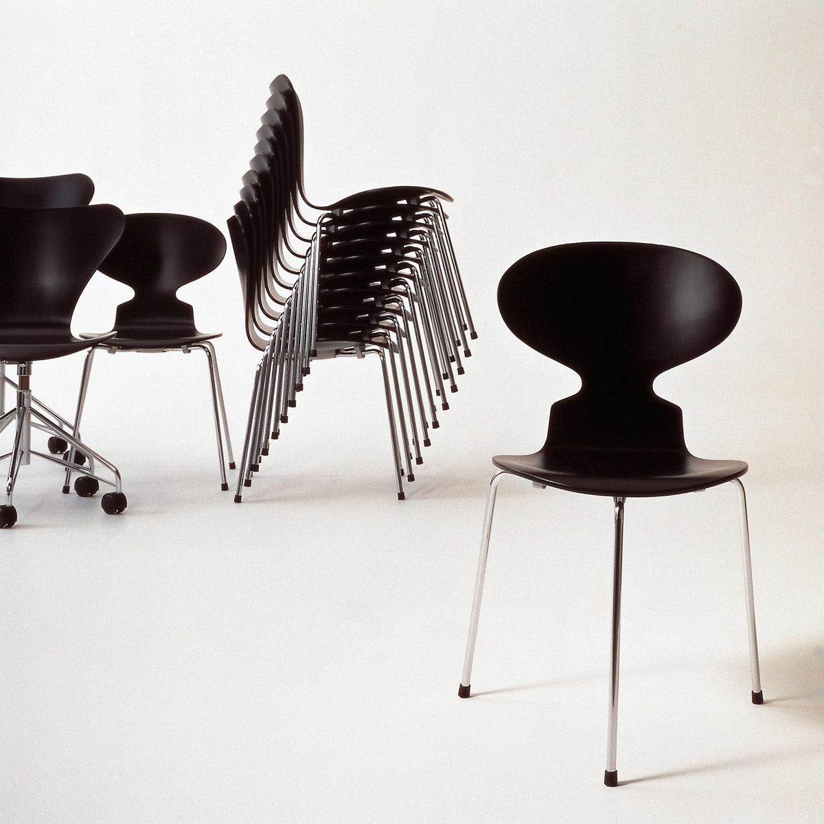 Ant Chair by Fritz Hansen, showing ant chairs in live shot.