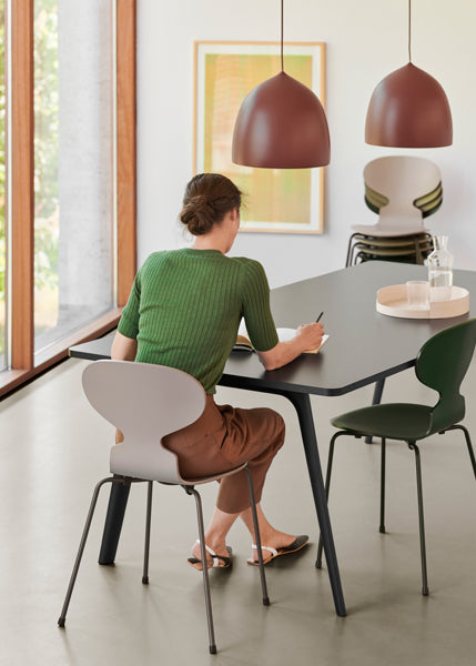 Ant Chair by Fritz Hansen, showing ant chairs in live shot.