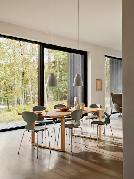 Ant Front Upholstery Chair by Fritz Hansen, showing ant front upholstery chairs in live shot.