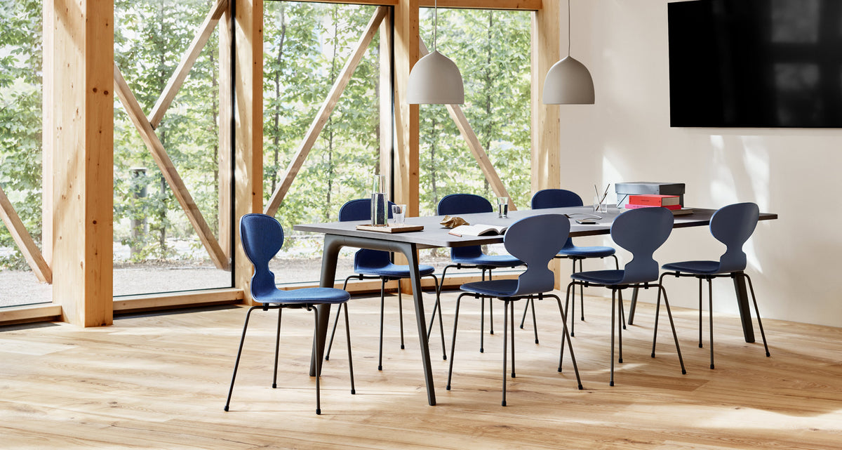 Ant Front Upholstery Chair by Fritz Hansen, showing ant front upholstery chairs in live shot.
