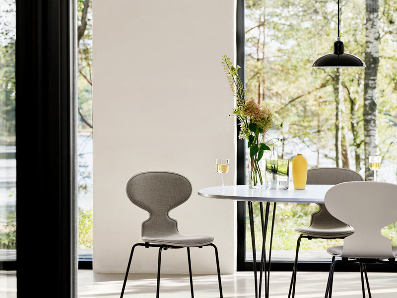 Ant Front Upholstery Chair by Fritz Hansen, showing ant front upholstery chairs in live shot.