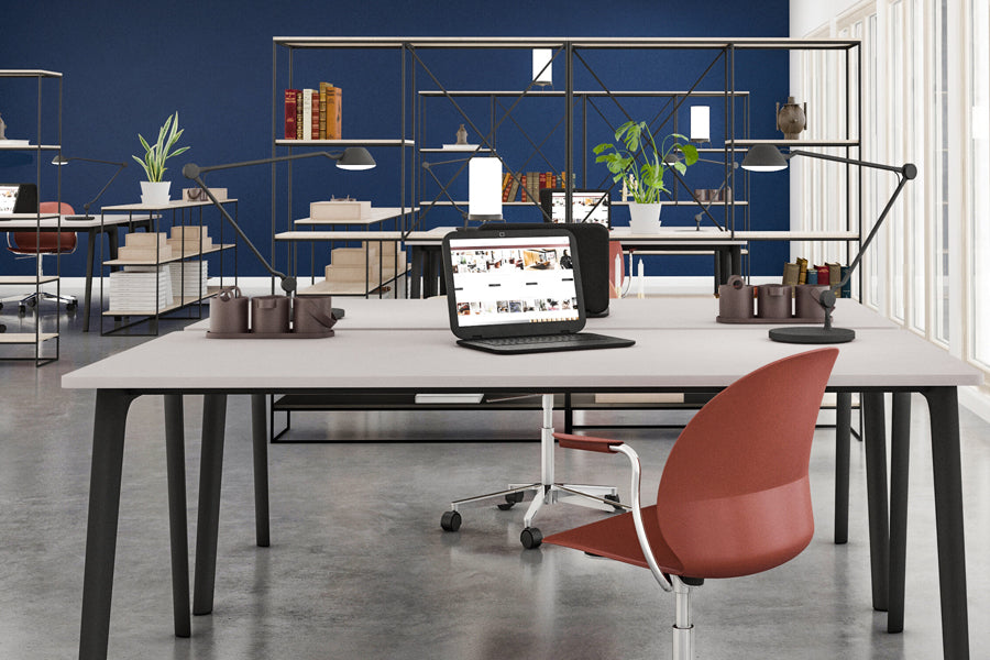 AQ01 Table Lamp by Fritz Hansen, showing aq01 table lamps in live shot.