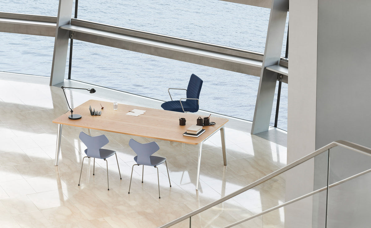 AQ01 Table Lamp by Fritz Hansen, showing aq01 table lamp in live shot.