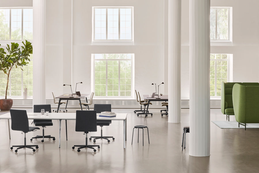 AQ01 Table Lamp by Fritz Hansen, showing aq01 table lamps in live shot.