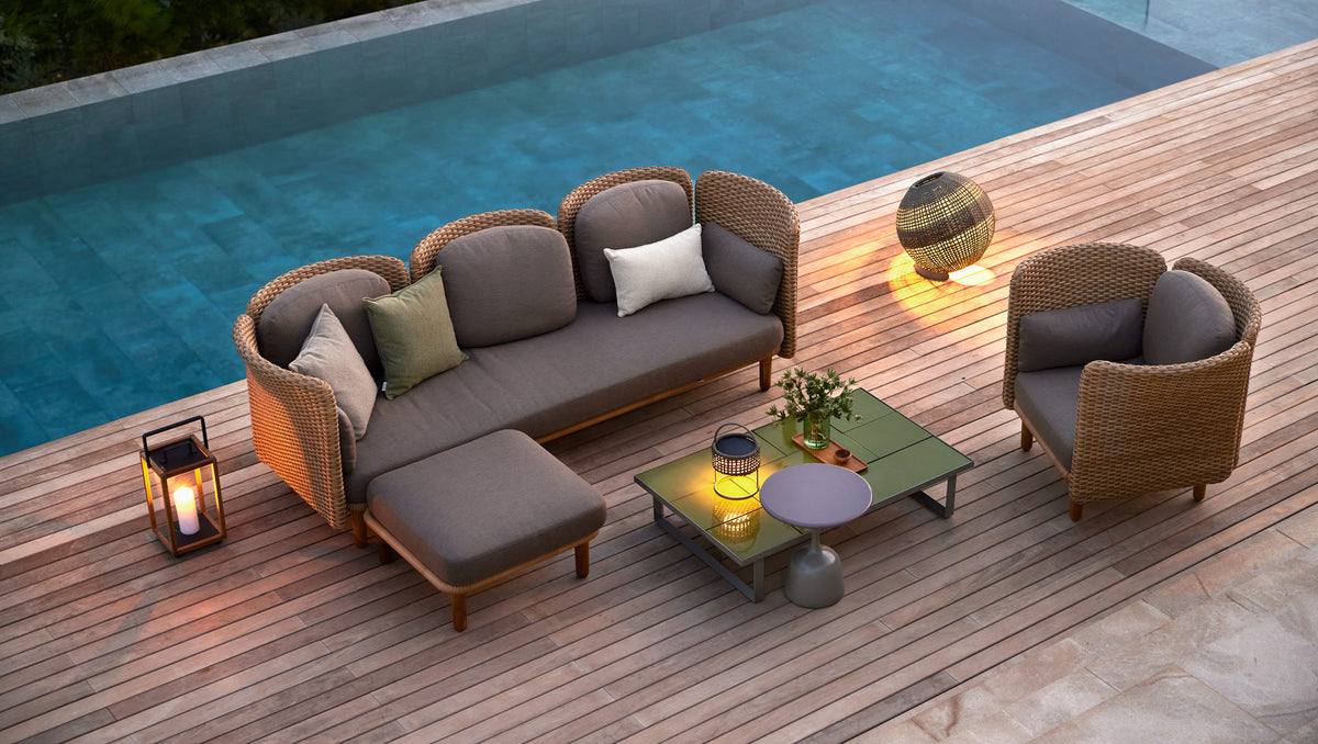 Arch Sectional by Cane-Line, showing arch sectional in live shot.