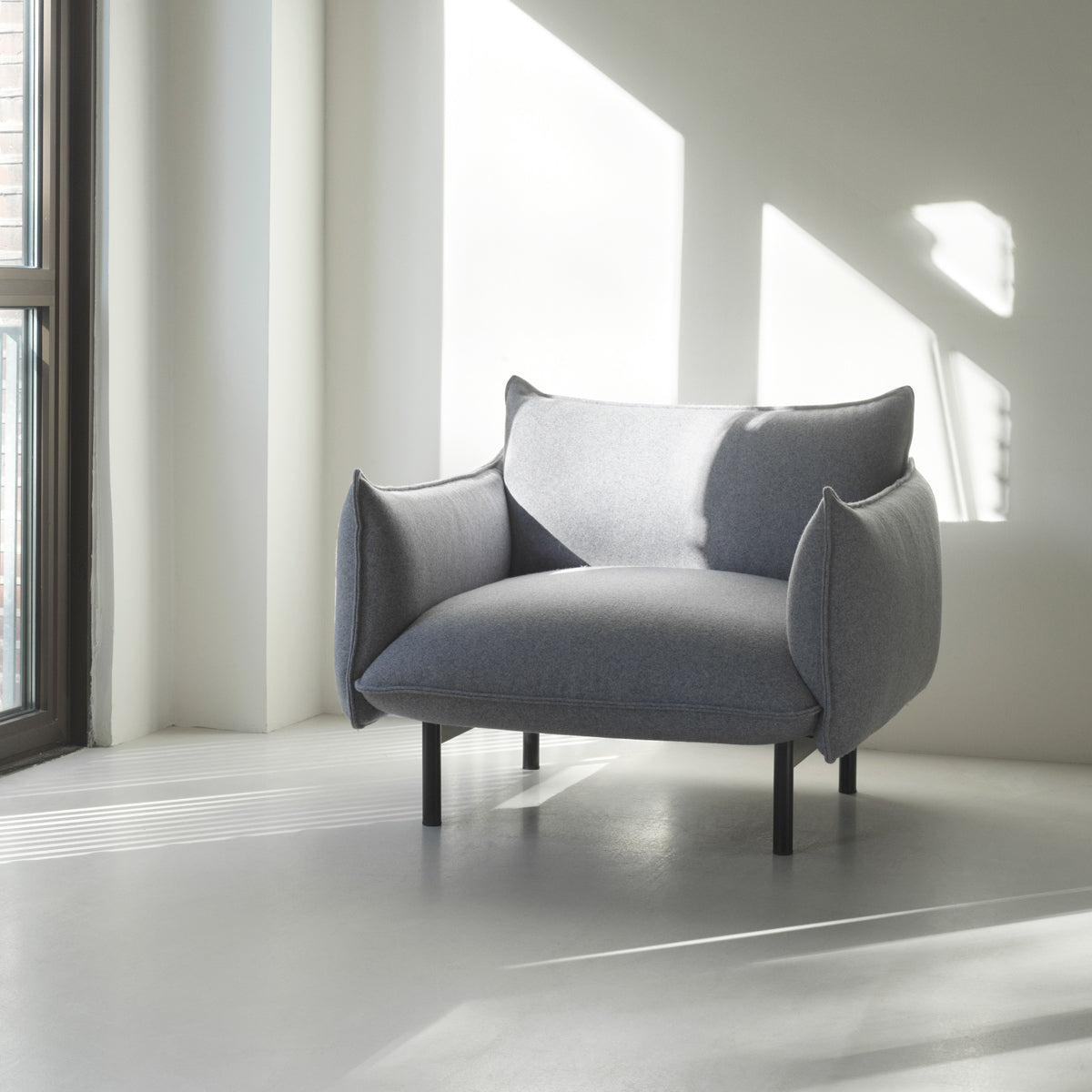 Ark Armchair by Normann Copenhagen, showing ark armchair in live shot.