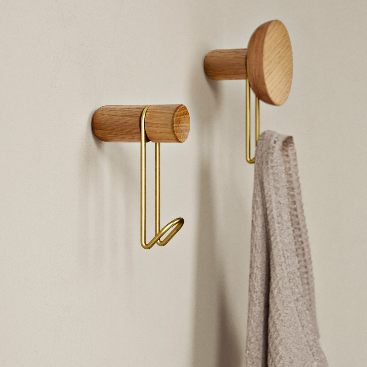 Around Wall Hanger by Woud, showing around wall hangers in live shot.
