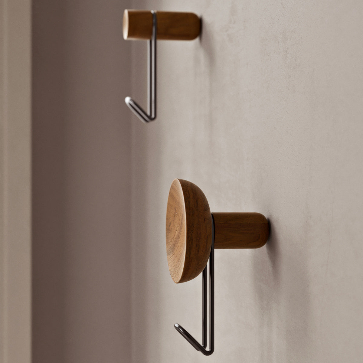 Around Wall Hanger by Woud, showing around wall hangers in live shot.