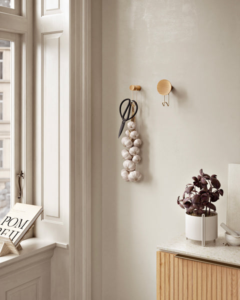 Around Wall Hanger by Woud, showing around wall hangers in live shot.