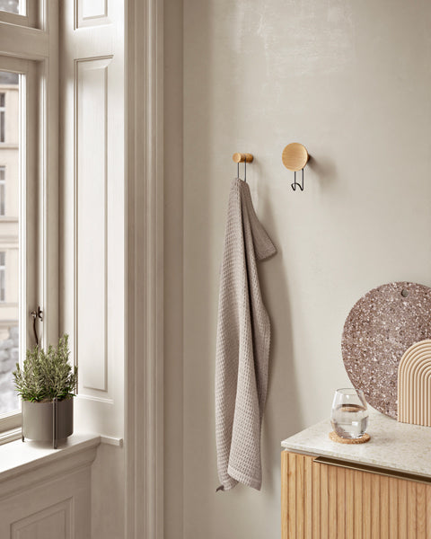 Around Wall Hanger by Woud, showing around wall hangers in live shot.