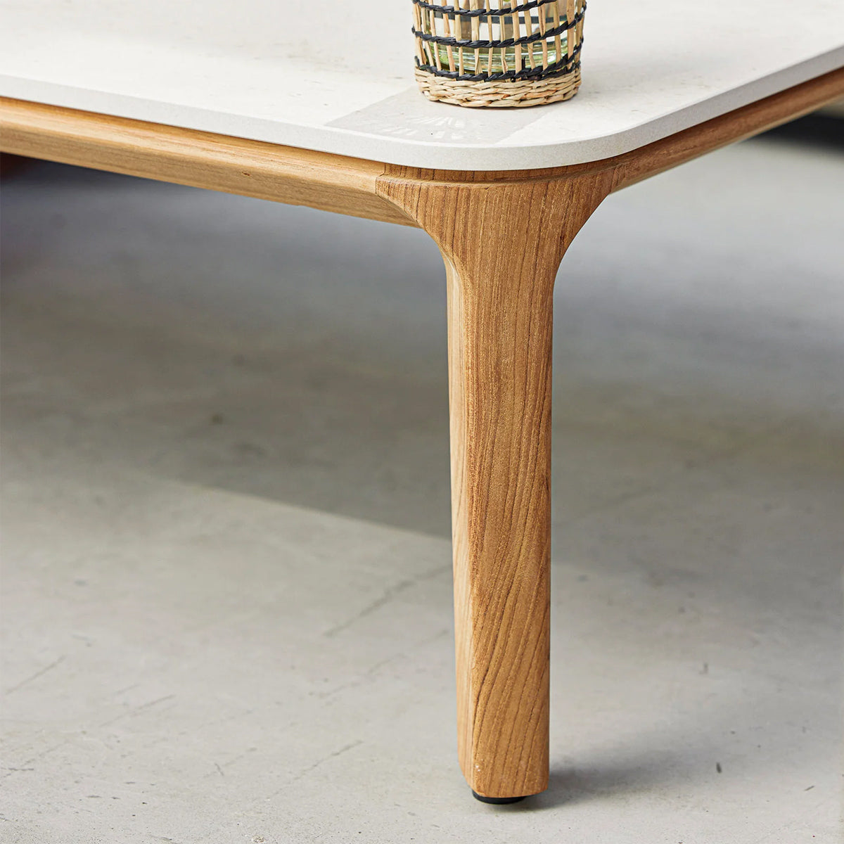 Aspect Coffee Table by Cane-Line, showing closeup view of aspect coffee table in live shot.
