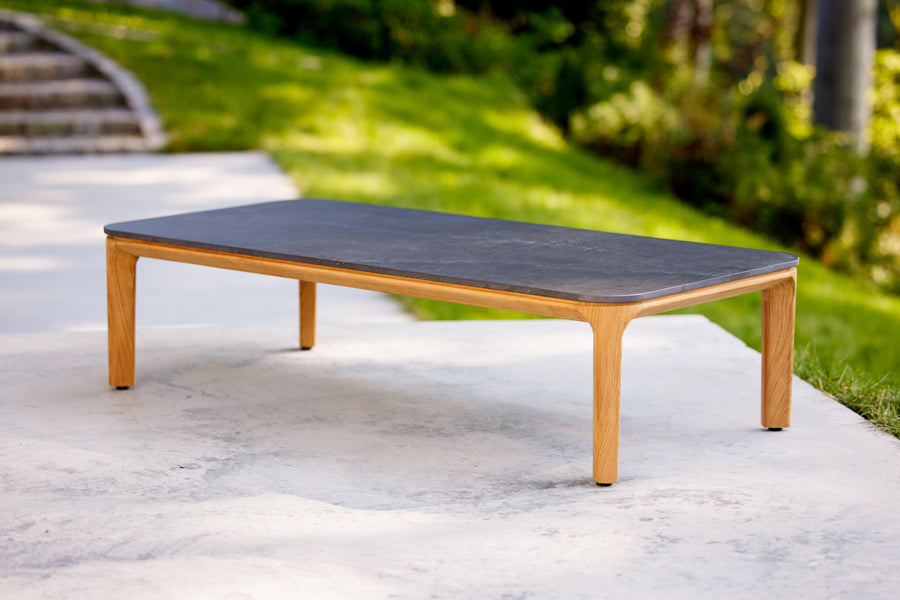Aspect Coffee Table by Cane-Line, showing aspect coffee table in live shot.