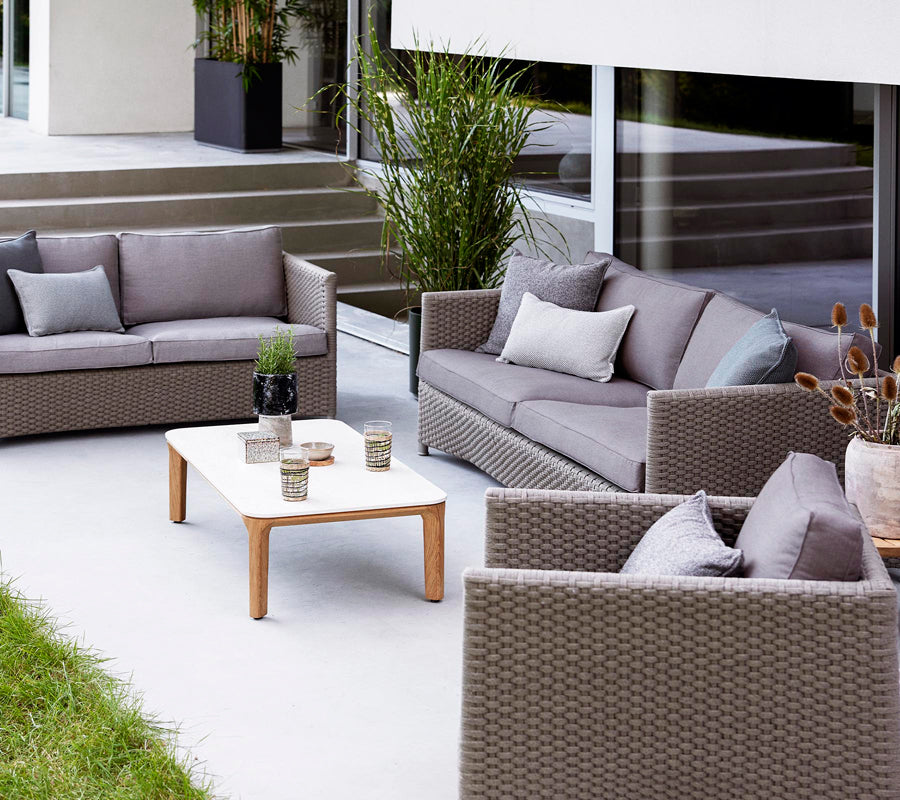Aspect Coffee Table by Cane-Line, showing aspect coffee table in live shot.