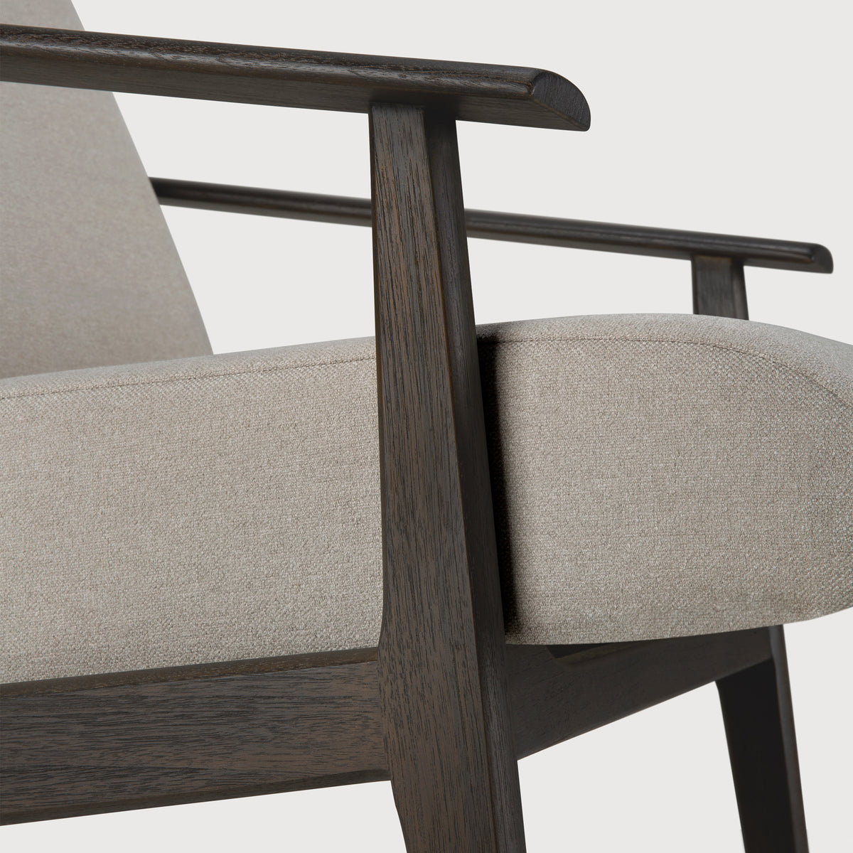 Aspekt Lounge Chair by Ethnicraft, showing closeup view of aspekt lounge chair.