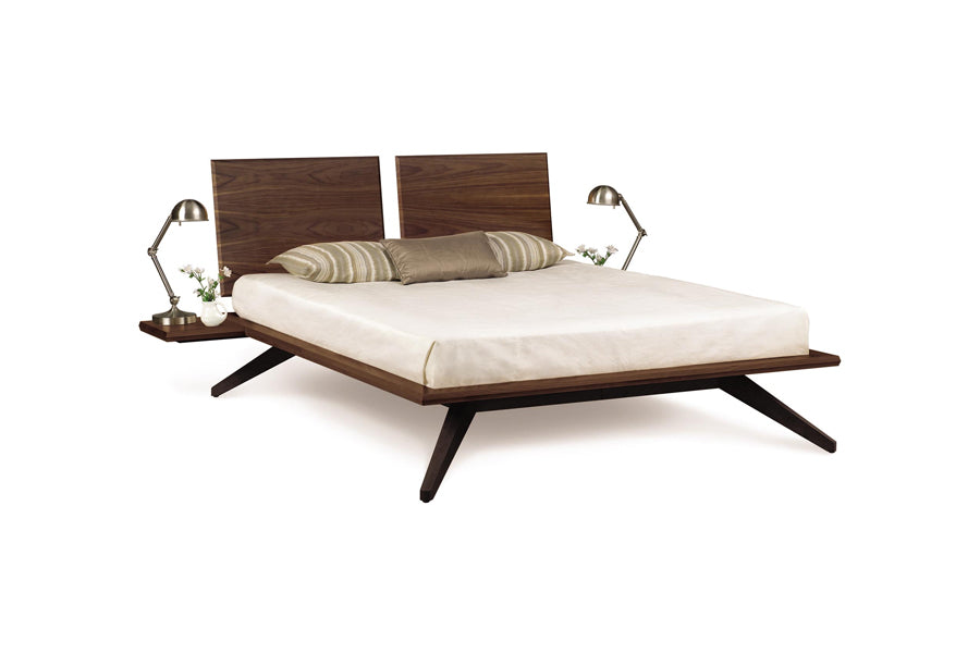 Astrid Nightstand by Copeland Furniture, showing angle view of astrid nightstands in shelf (left/right)/natural walnut with bed.