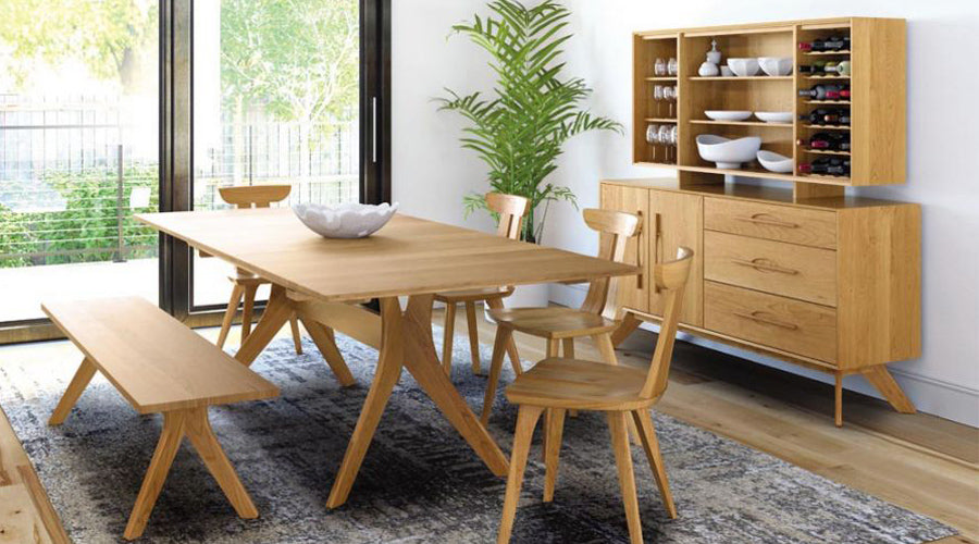Audrey Buffet by Copeland Furniture, showing audrey buffet with dining table and chair in live shot.