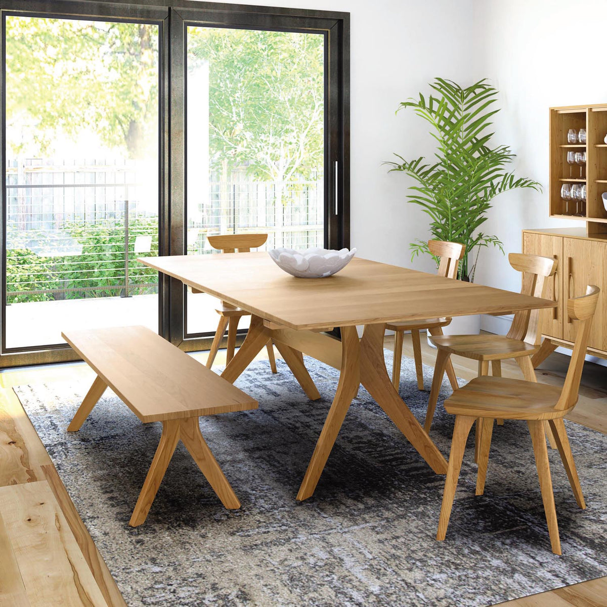 Audrey Dining Table by Copeland Furniture, showing audrey dining table in live shot.