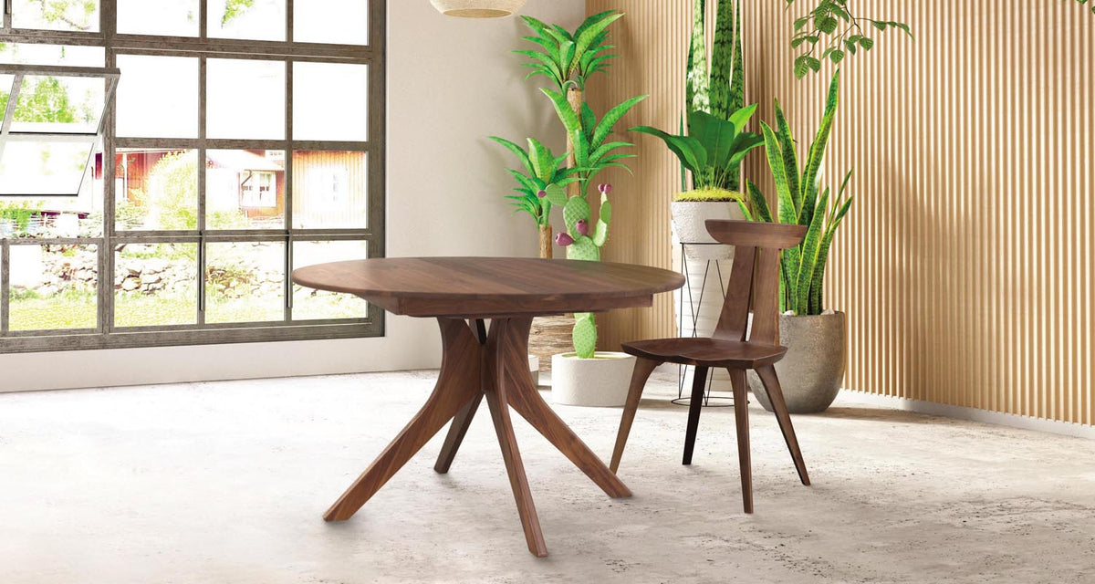 Audrey Round Extension Table by Copeland Furniture, showing audrey round extension table with chair in live shot.