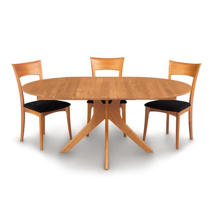 Audrey Round Extension Table by Copeland Furniture, showing natural cherry audrey round extension table with chairs.