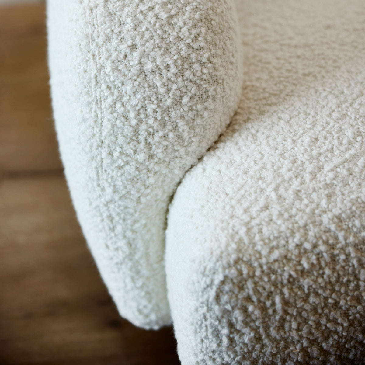 Aura Lounge Chair by Cane-Line, showing closeup view of aura lounge chair in live shot.