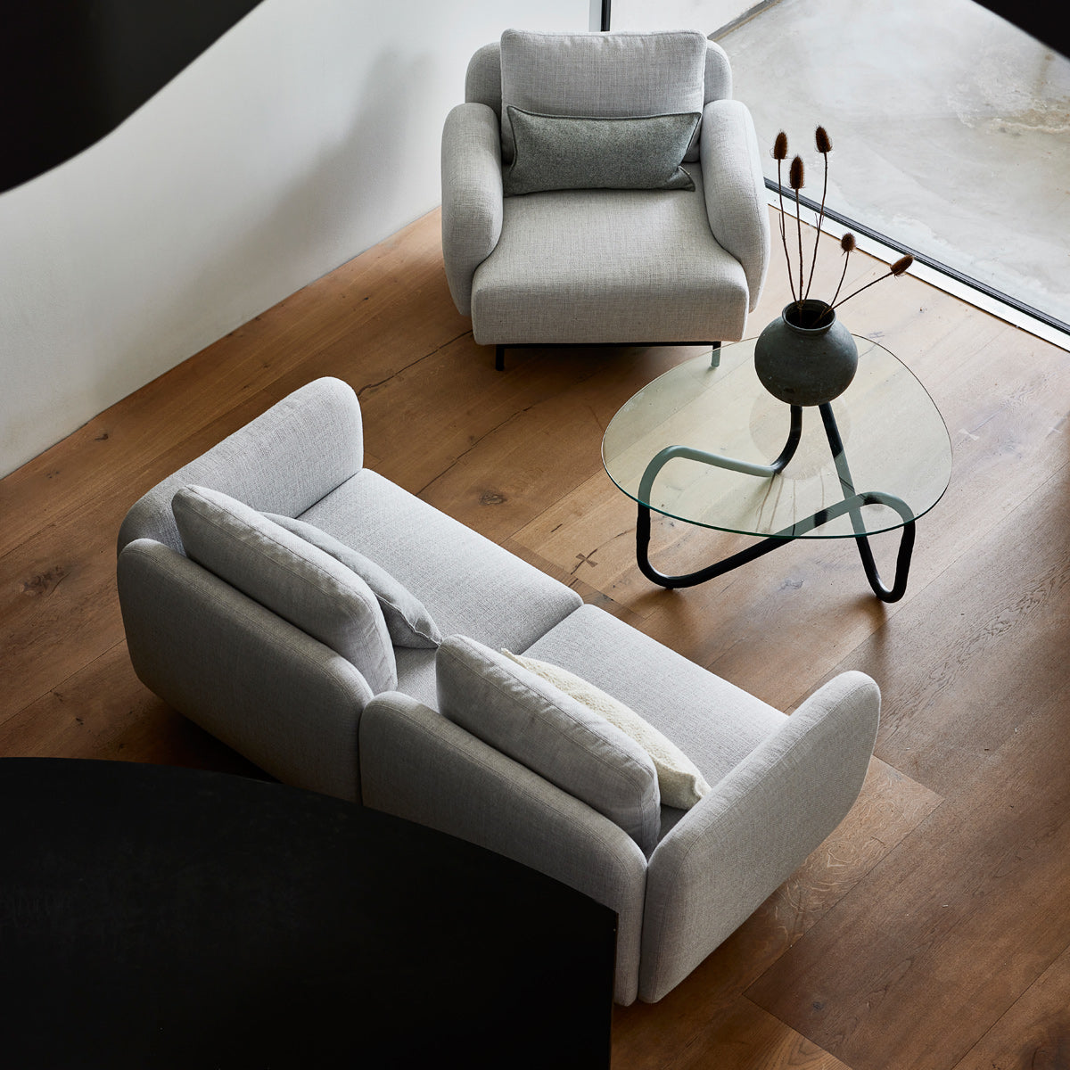 Aura Lounge Chair by Cane-Line, showing aura lounge chair in live shot.