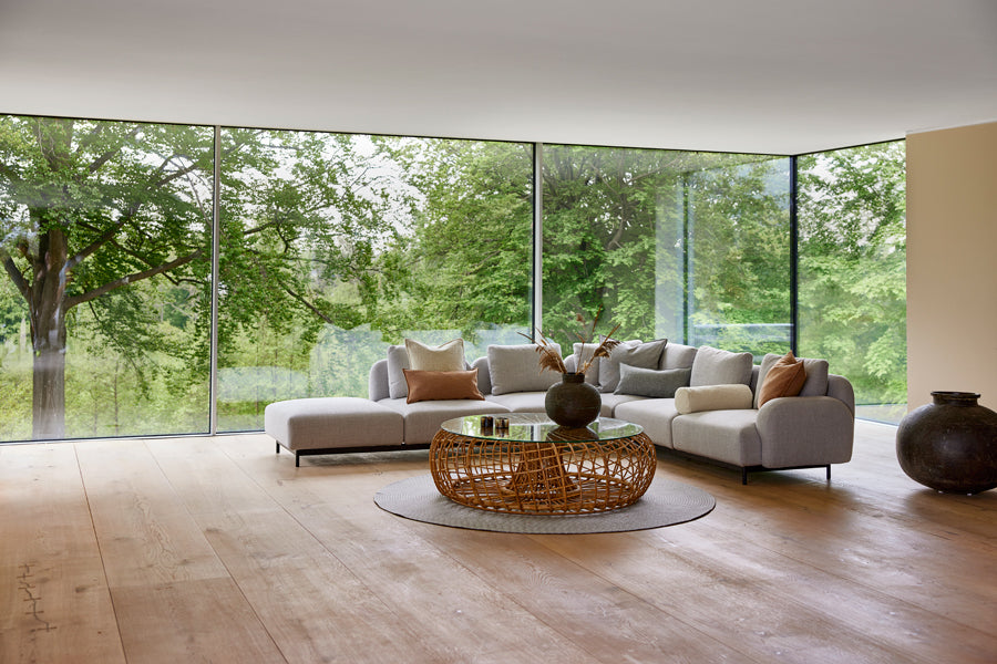 Aura Sectional by Cane-Line, showing aura sectional in live shot.