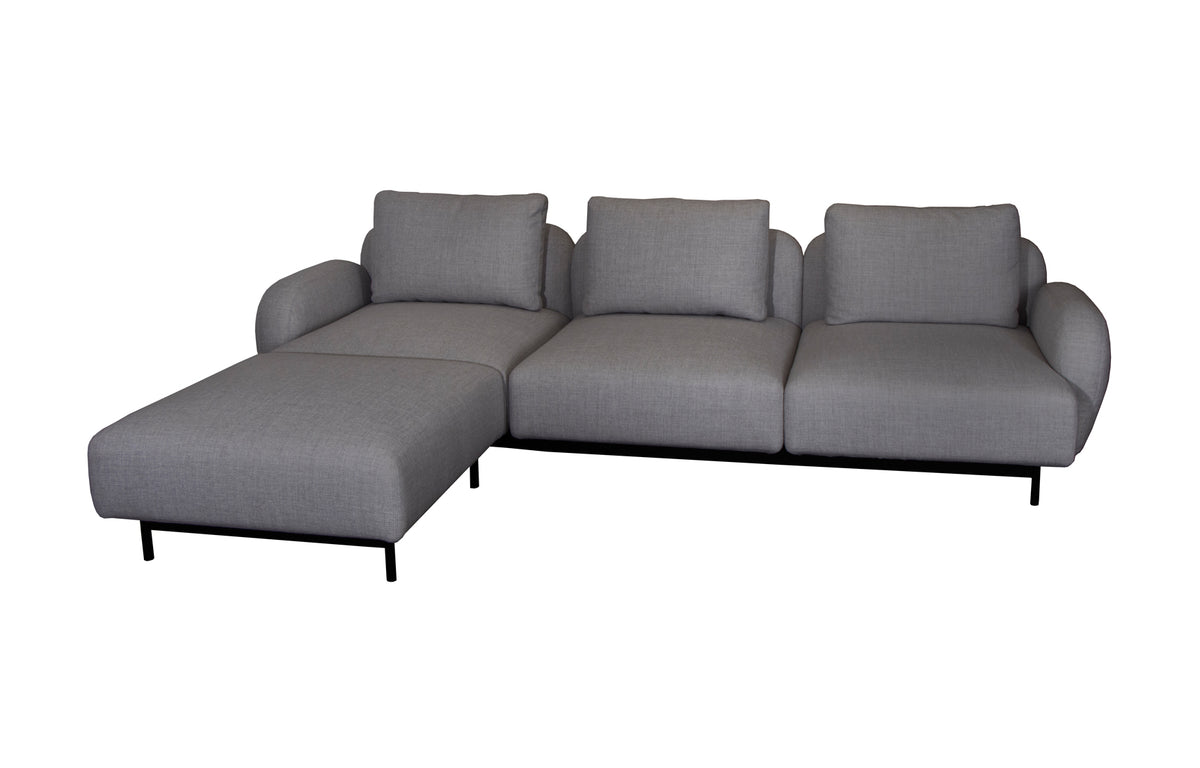 Aura Sectional by Cane-Line - 3-Seater Sofa with Chaise Lounge, Dark Grey Ambience Fabric.