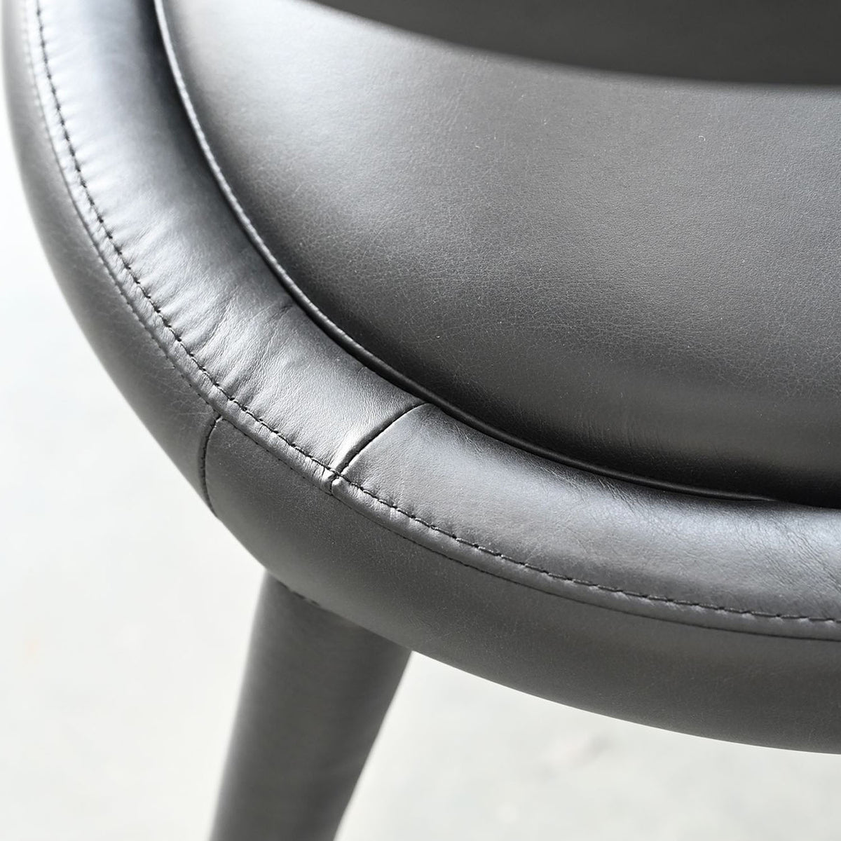 Avalon Dining Armchair by Mobital, showing closeup view of avalon dining armchair. 
