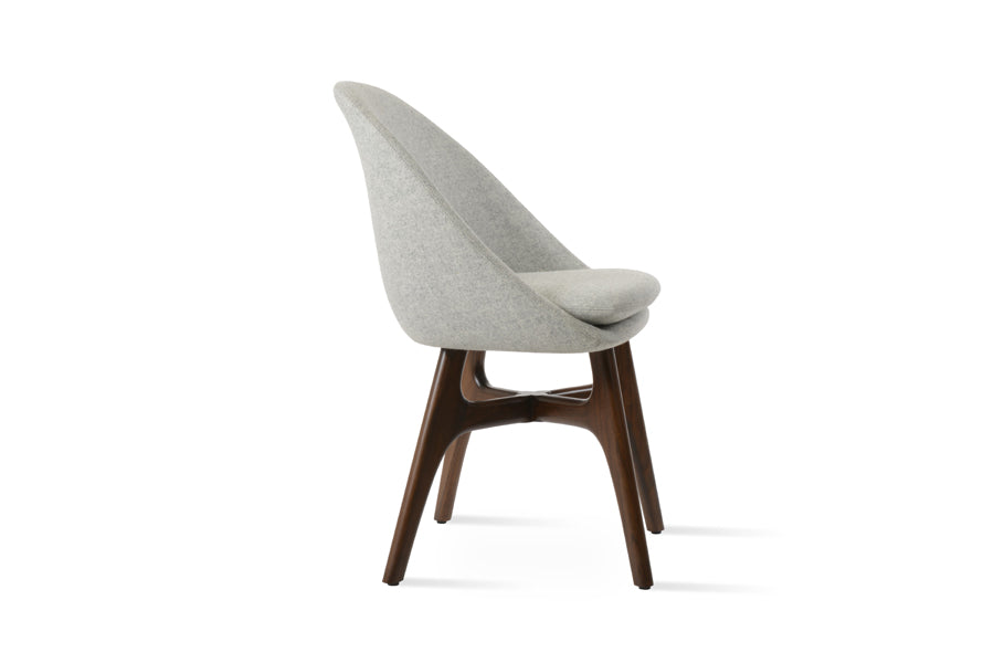 Avanos Wood Dining Chair by SohoConcept, showing side view of avanos wood dining chair in camira blazer silver wool.