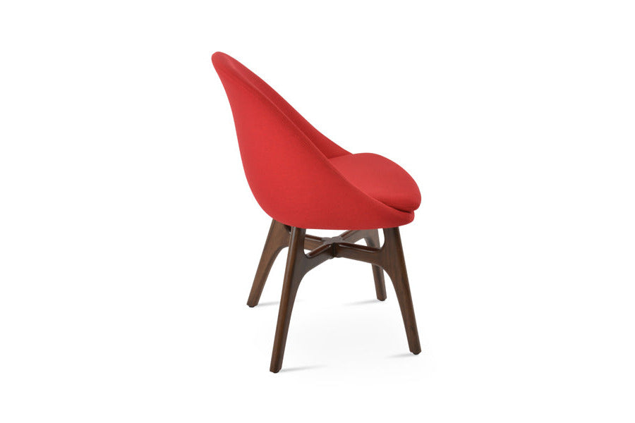 Avanos Wood Dining Chair by SohoConcept, showing side view of avanos wood dining chair in camira era red wool.