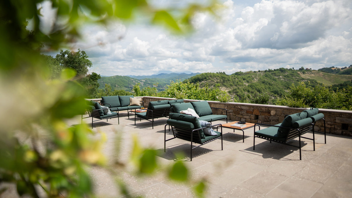 Avon Outdoor Chair by Houe, showing avon outdoor chairs in live shot.
