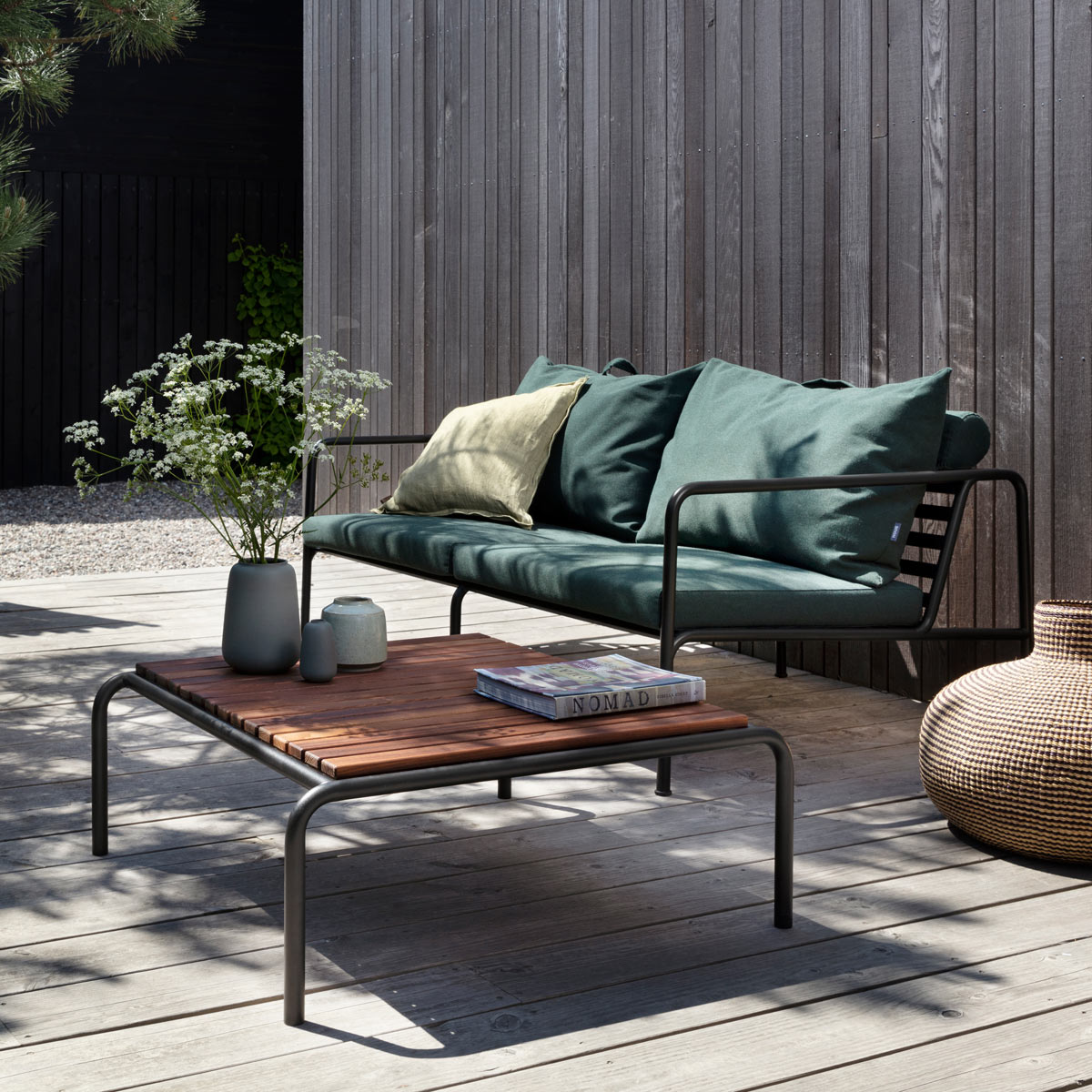 Avon Outdoor Coffee Table by Houe, showing avon outdoor coffee table in live shot.