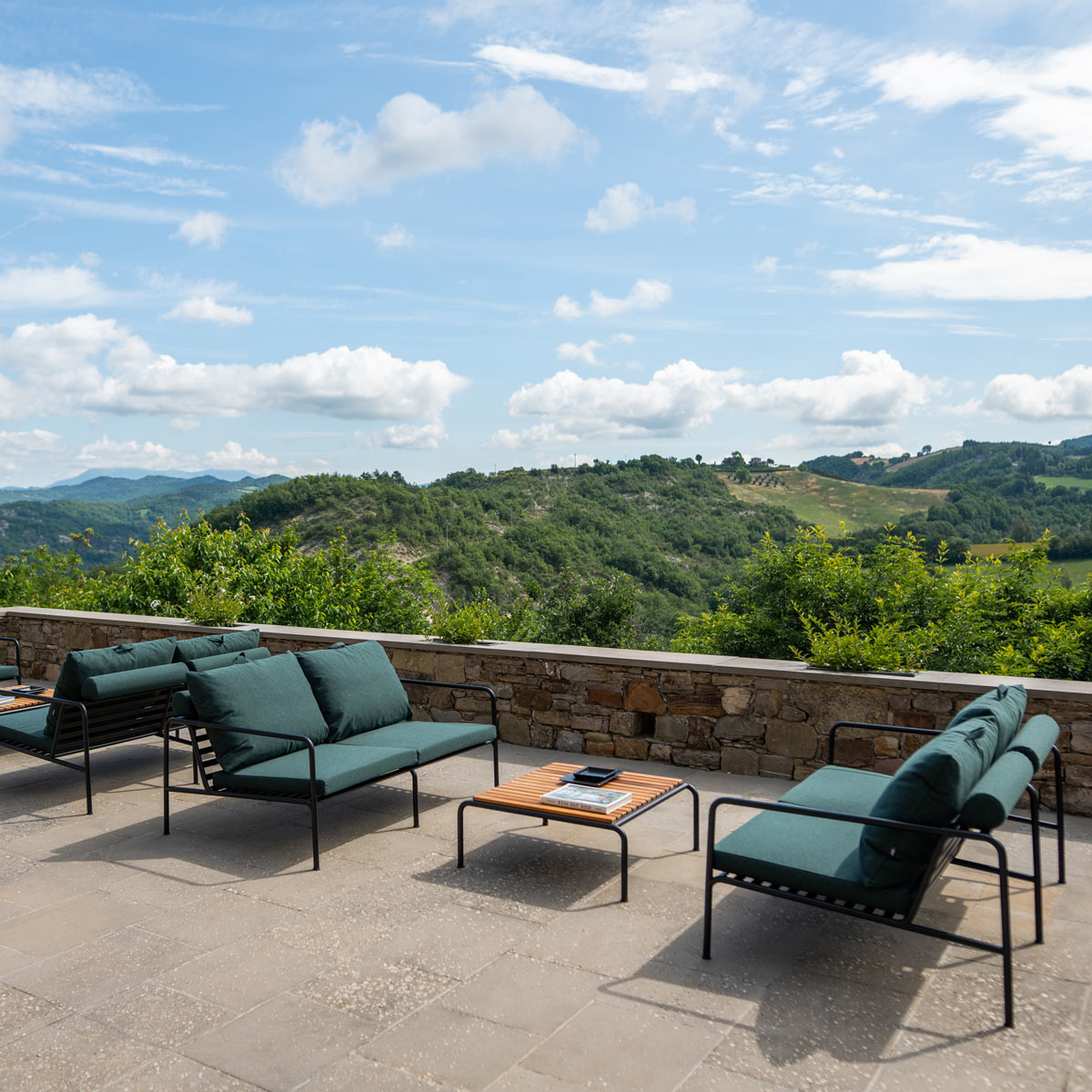 Avon Outdoor Coffee Table by Houe, showing avon outdoor coffee table in live shot.