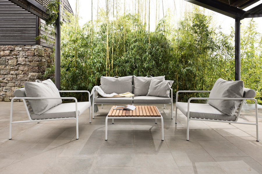 Avon Outdoor Coffee Table by Houe, showing avon outdoor coffee table in live shot.