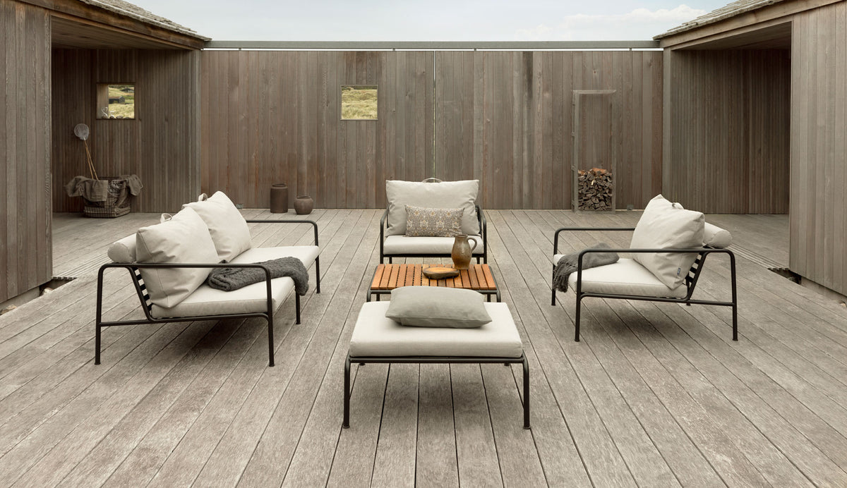 Avon Outdoor Ottoman by Houe, showing avon outdoor ottoman in live shot.