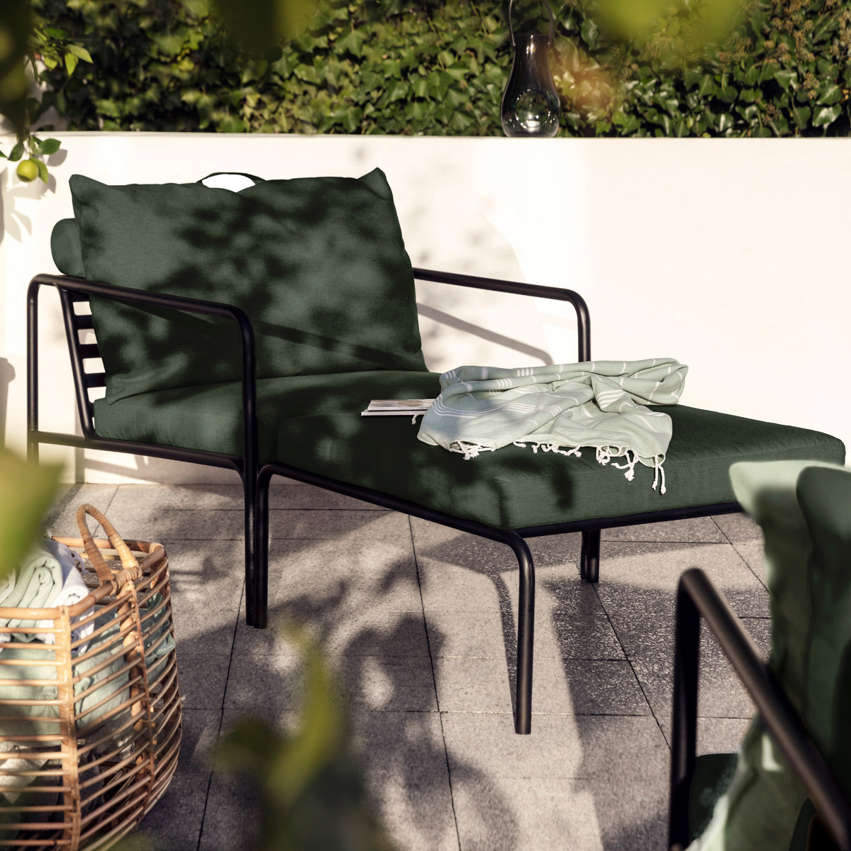 Avon Outdoor Ottoman by Houe, showing avon outdoor ottoman in live shot.