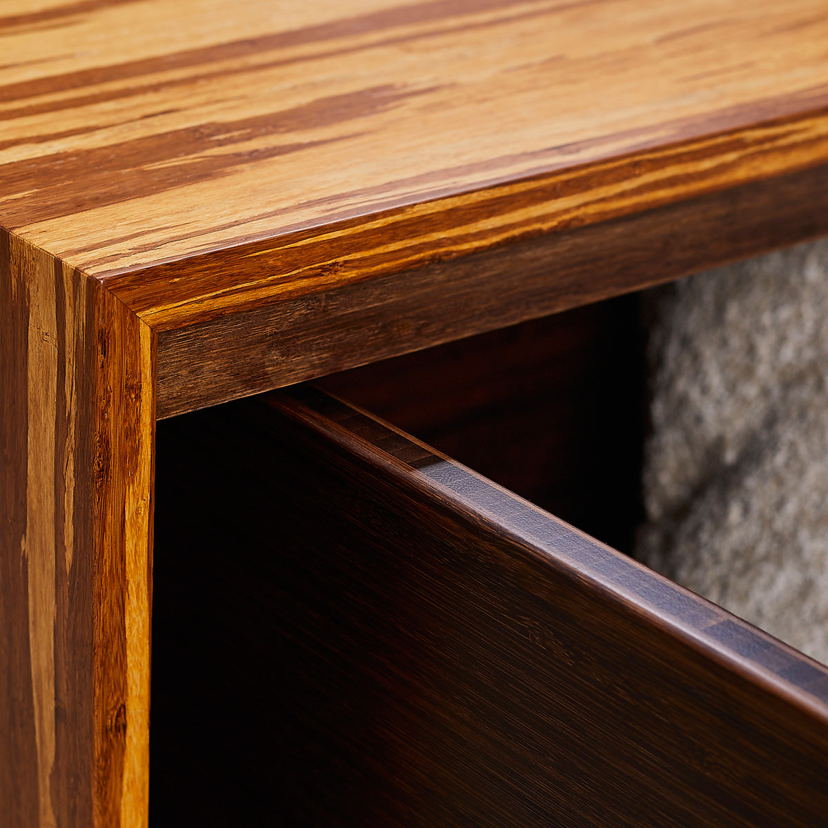 Azara Cube Coffee Table by Greenington, showing closeup view of azara cube coffee table in live shot.