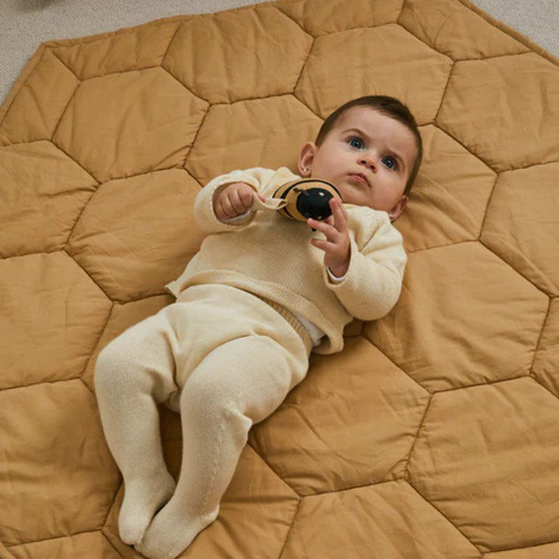 Playmat Honeycomb by Lorena Canals, showing playmat honeycomb in live shot.