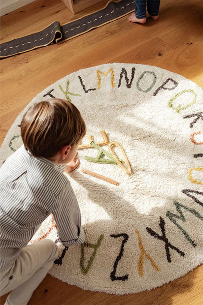Back-to-School Rug by Lorena Canals, showing back-to-school rug in live shot.