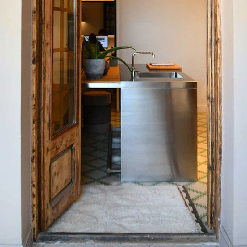 Bahari Wool Rug by Lorena Canals, showing bahari wool rug in live shot.