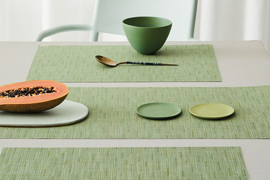 Bamboo Tabletop by Chilewich, showing closeup view of bamboo tabletops in live shot.