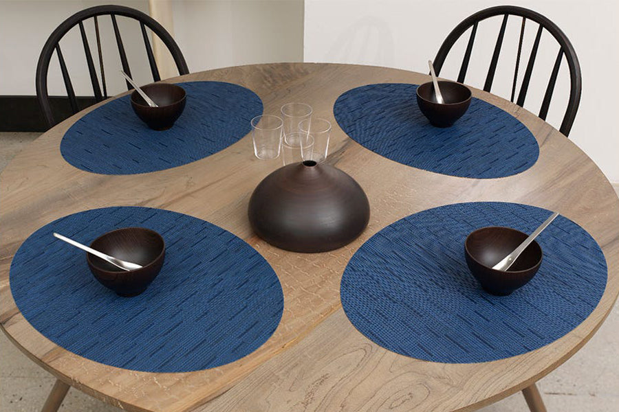 Bamboo Tabletop by Chilewich, showing bamboo tabletops in live shot.