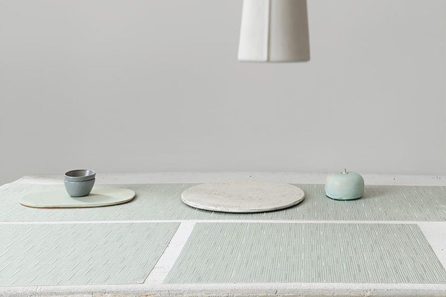 Bamboo Tabletop by Chilewich, showing closeup view of bamboo tabletops in live shot.