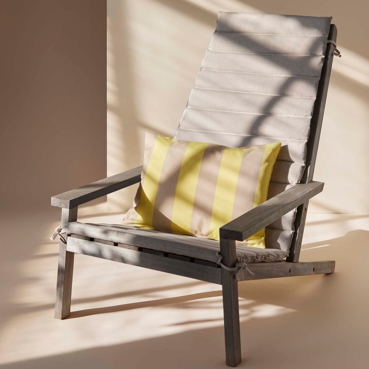 Barriere Pillow by Skagerak, showing barriere pillow in live shot.