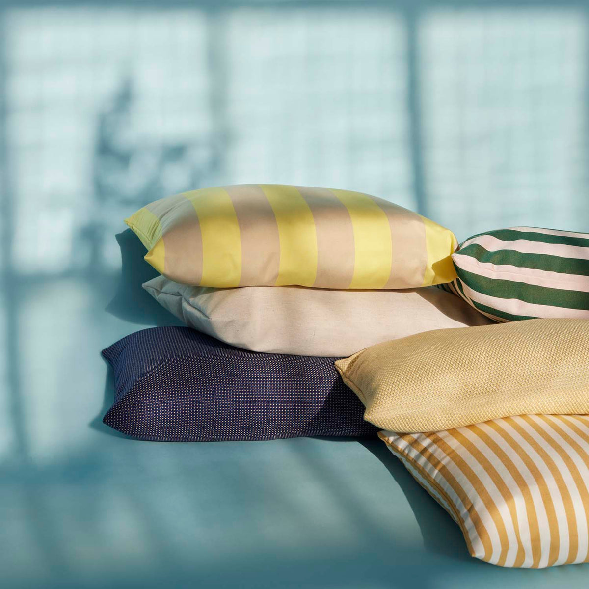 Barriere Pillow by Skagerak, showing barriere pillow in live shot.