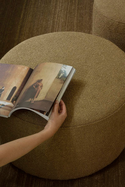 Barrow Pouf by Ethnicraft, showing closeup view of barrow pouf in live shot.