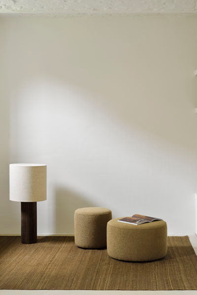 Barrow Pouf by Ethnicraft, showing barrow pouf in live shot.